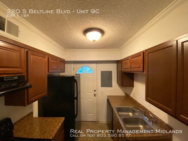 Building Photo - Woodland Terrace Townhouse!