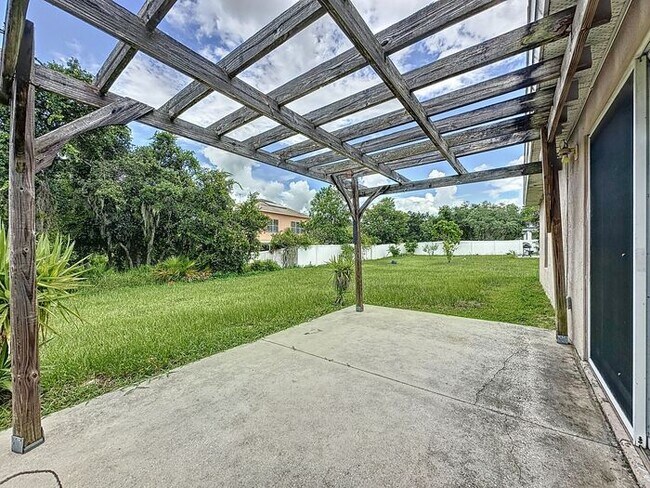 Building Photo - Poinciana single family home in Village 7,...