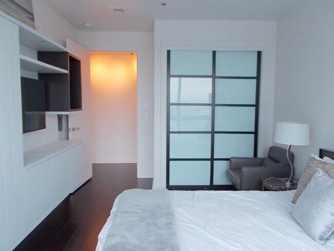 Building Photo - Experience elevated high-rise living at The Martin.