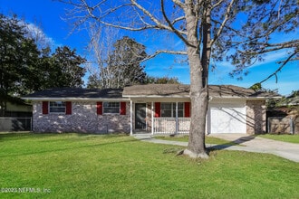 Building Photo - 7421 Deepwood Dr N