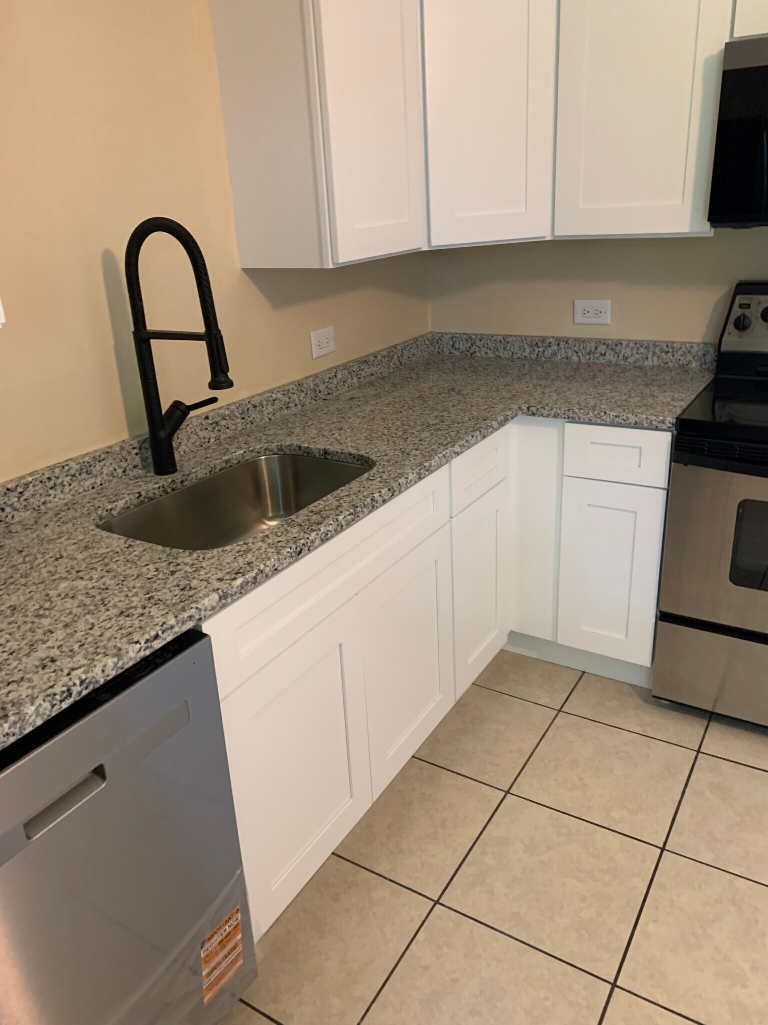 New cabinets, granite, sink, electric, and faucet - 13918 Marybrook Dr