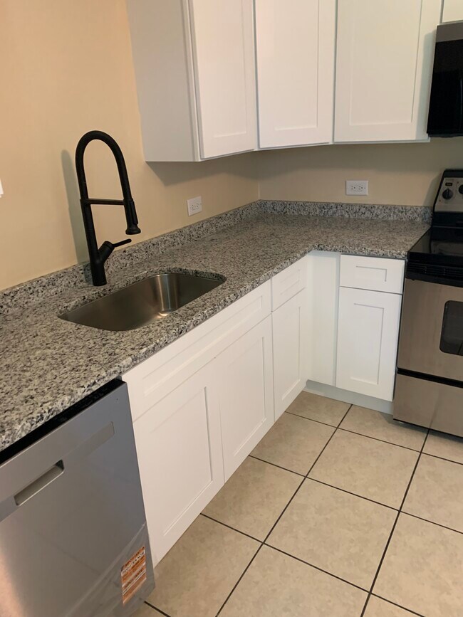 New cabinets, granite, sink, electric, and faucet - 13918 Marybrook Dr