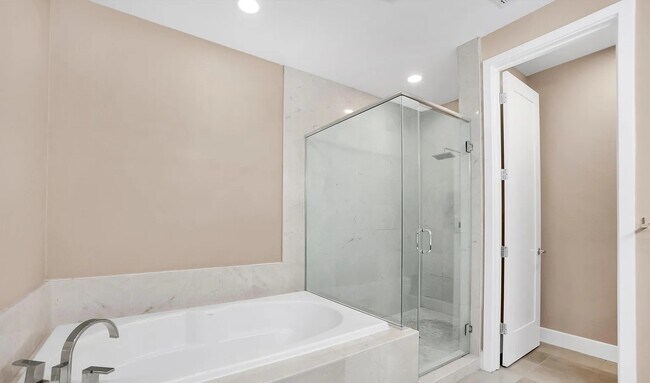Primary bathroom with large tub and shower - 138 Summit Way