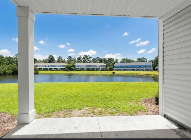 Building Photo - First Floor Comfort Meets Picture Perfect Pond Views