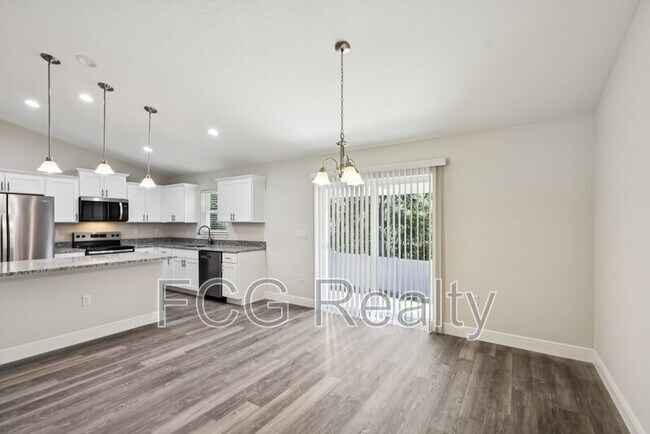 Building Photo - 10675 N Adler Dr