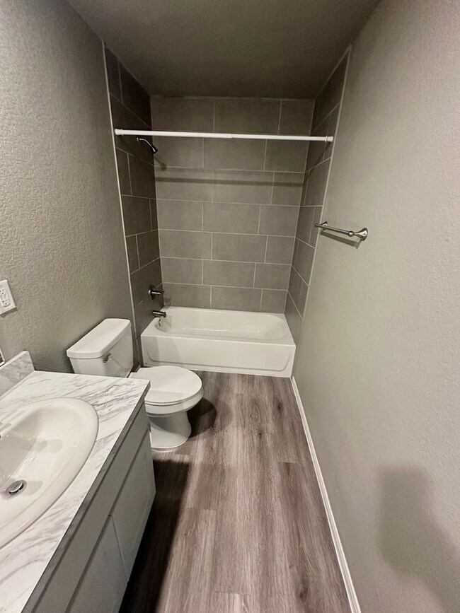 Building Photo - NEW IN MANAGEMENT - AVAILABLE NOW!