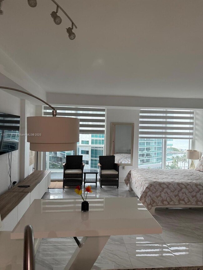 Building Photo - 10275 Collins Ave
