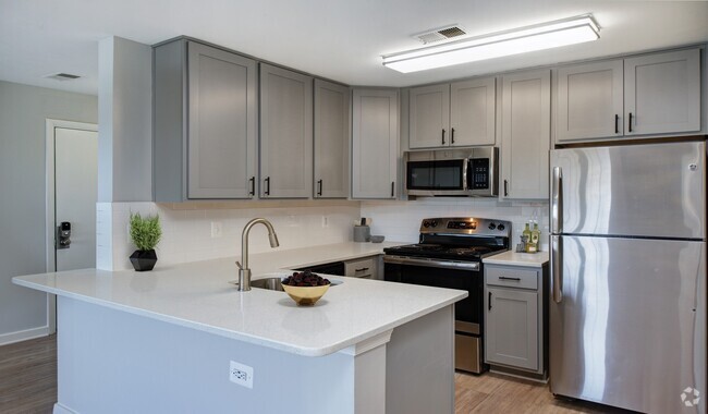 Open floorplans with wood flooring throughout - Bent Tree Apartments