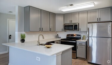 Open floorplans with wood flooring throughout - Bent Tree Apartments