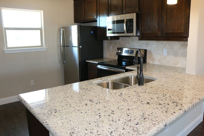 Building Photo - 1301-1305 White Sand Dr.