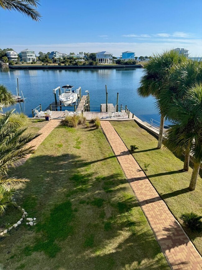 Building Photo - Waterfront Shell Point Home with Dock, Hot Tub, Elevator, & Golf Cart