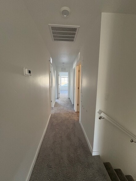 Hallway top of stairs - 4138 W Perspective St
