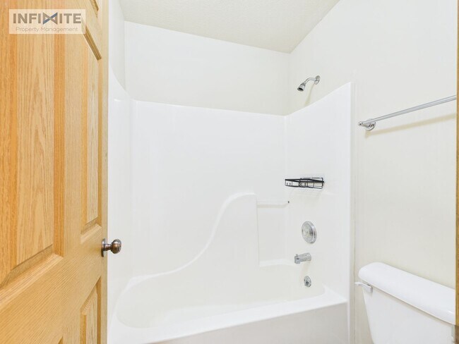 Building Photo - Spacious 2 Bedroom, 2 Bath Condo w/ Detached Garage – Move-In Ready!