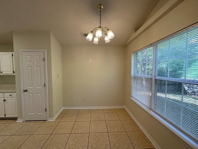 Building Photo - Updated 3 bedroom 2 bath brick home located in the Cottages at Marcus Lake!