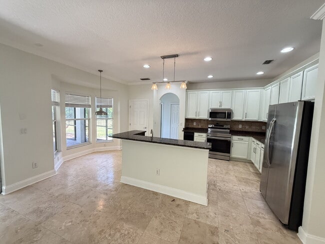 Building Photo - Elegant 5-Bedroom Home in Coveted Cory Lak...