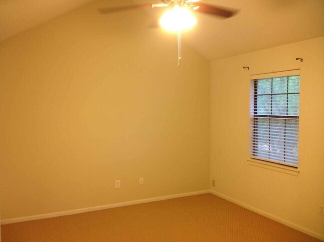 Master bedroom with walk-in closet - 217 SW Pinetree Ln