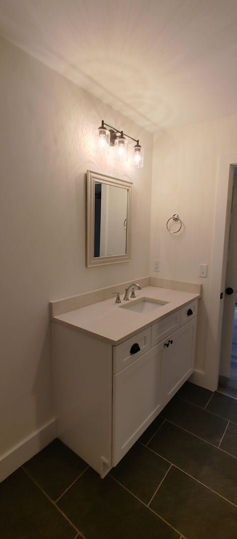 Building Photo - 5-bedroom home with 3 car garage and fully...
