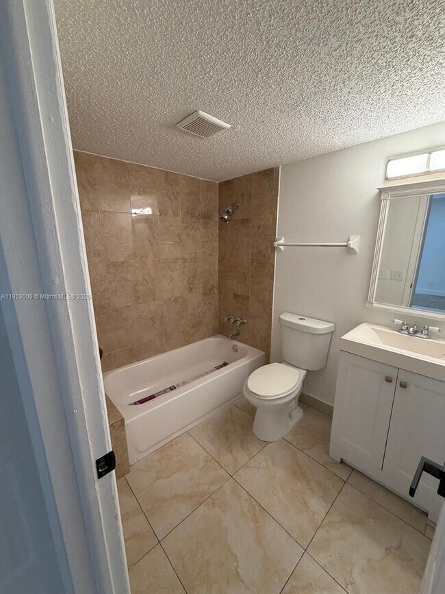 Building Photo - 10701 Royal Palm Blvd