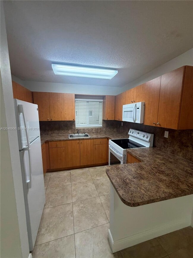 Building Photo - 1650 W 44th Pl