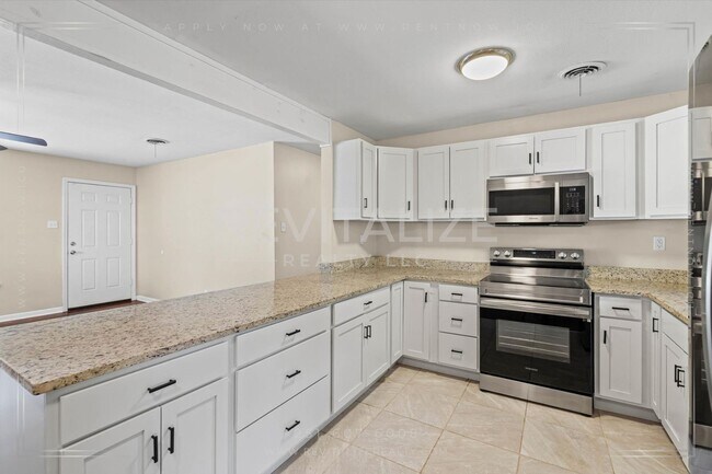 Building Photo - Stylish 3 Bed Brick Home | Modern Kitchen + Large Private Backyard