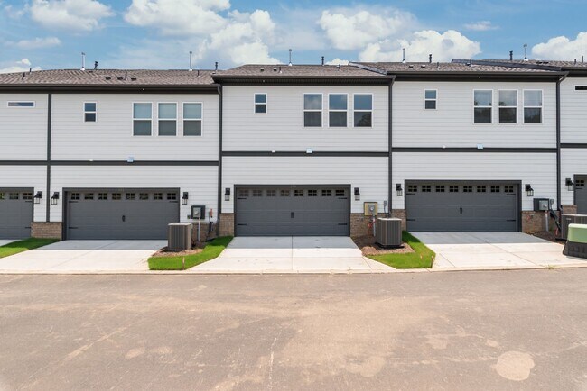 Building Photo - Welcome home to this stunning brand-new townhome in one of Indian Trail's newest and most desirab...