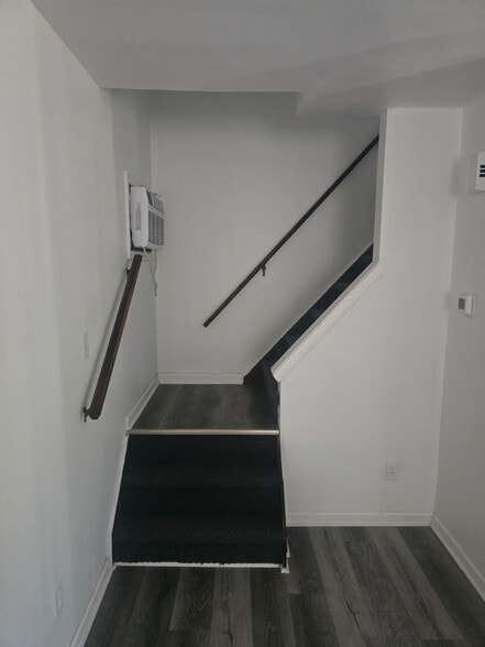Lower stair ac unit - 1001 Romayne Ave