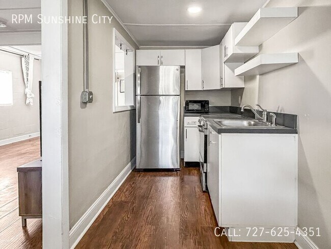 Building Photo - 1515 E 31st Ave