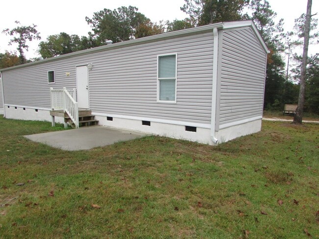 Primary Photo - Single wide trailer on block foundation - ...