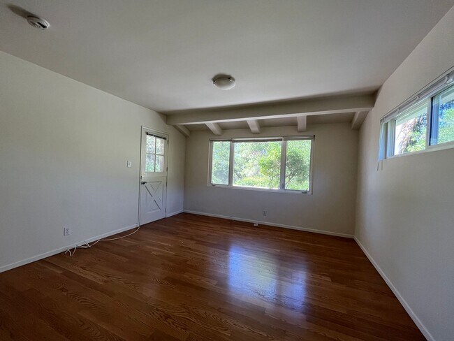 Building Photo - A hidden gem with tree-top view. Tranquil and private. Light and airy