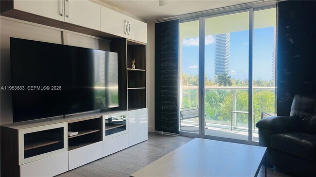 Building Photo - 19390 Collins Ave