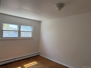 Building Photo - 69-35 De Costa Ave