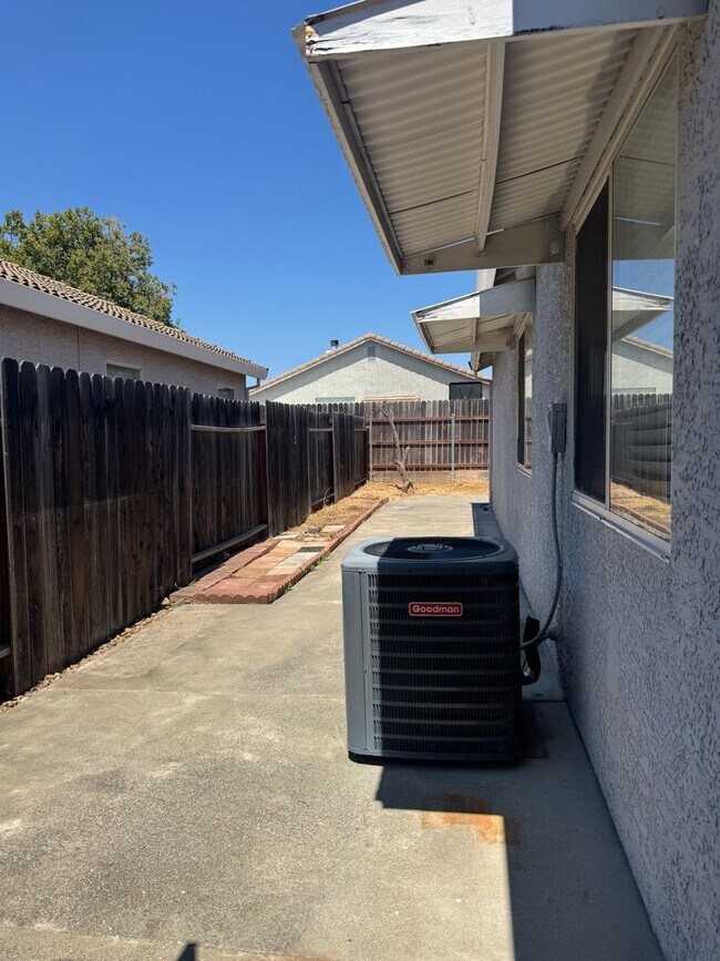 Building Photo - Beautiful 4-Bedroom Home with Solar, High ...