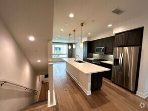 Building Photo - Fantastic 3 Story Townhome - 2 bedrooms - ...