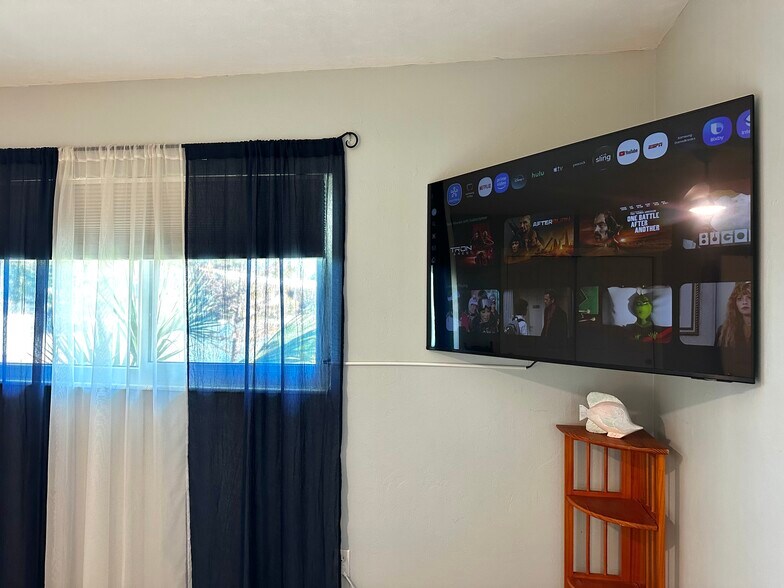 55" TV in Primary Bedroom - 3605 Iroquois Ave