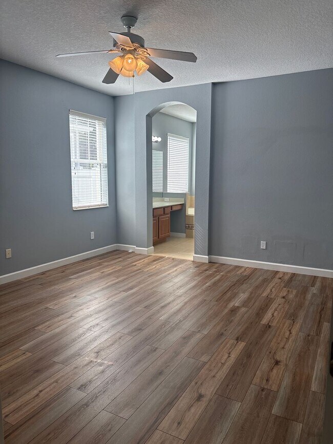 Building Photo - Beautiful 4-Bedroom Home in the Gated Water’s Edge Community/Lake Nona