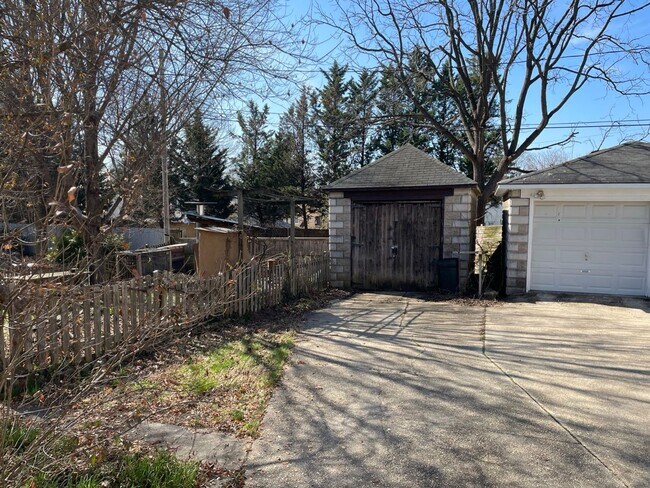 Building Photo - Lauraville 4-Bedroom, 2-Bathroom American Foursquare Home with Beautiful Outdoor Space