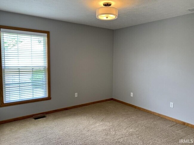 Building Photo - 1209 W Aspen Ct