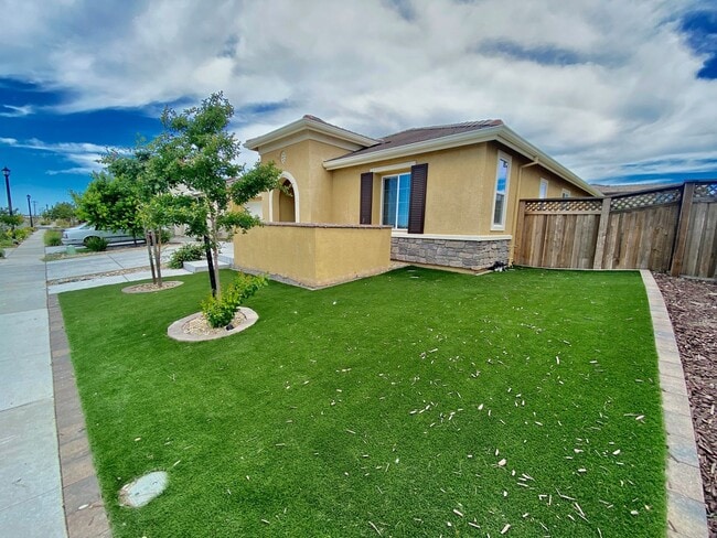 Building Photo - ALMOST NEW, UNIQUE 4 BEDROOM, 3 BATH, 2 CA...