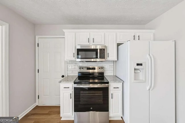 Building Photo - 7091 Greenridge Dr