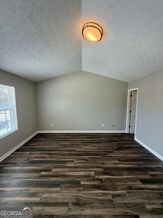 Building Photo - 5696 Windfall Ln
