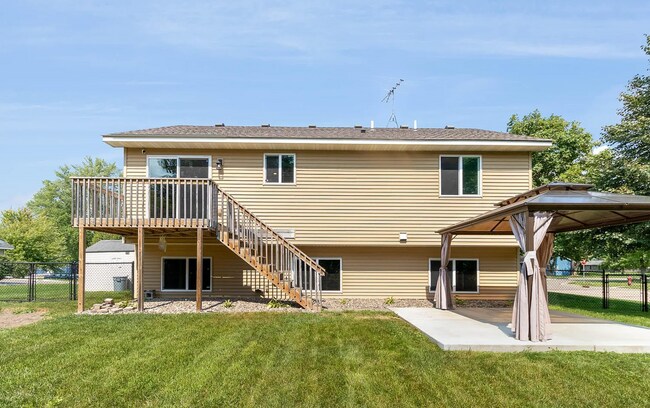 Building Photo - Modern 4BR Home with Fenced Yard + Garage ...