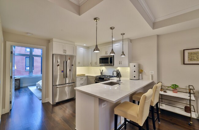 Building Photo - Pets Welcome!! Private Garage Parking Avai...