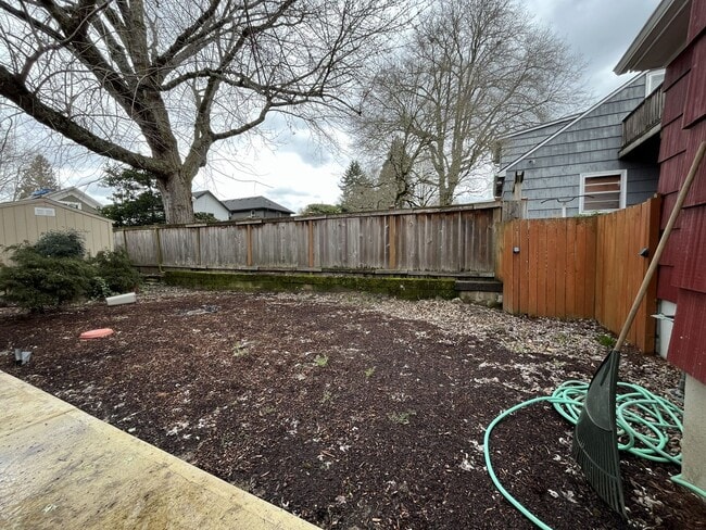 Building Photo - Classic Brick Portland Home on Stark Street with Dual Living Areas and Two Full Kitchens