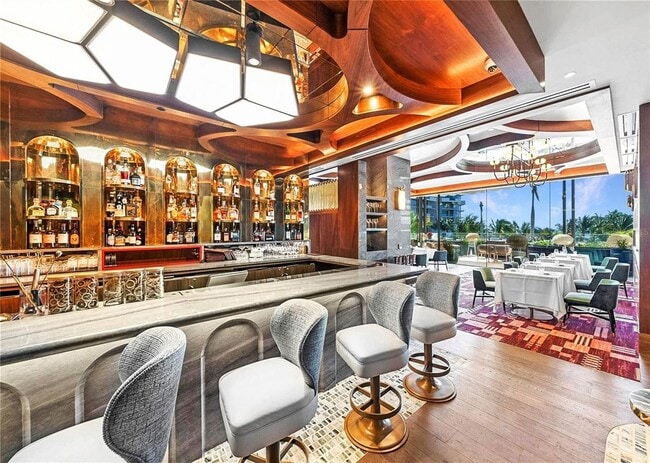 Building Photo - Luxury Furnished Gulf-Front Condo at The St. Regis Residences, Longboat Key, FL