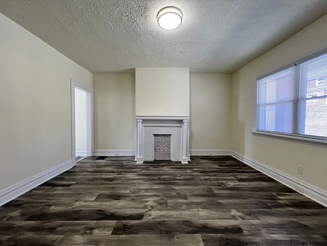 Building Photo - Updated 3BR house with multi-car off street parking!