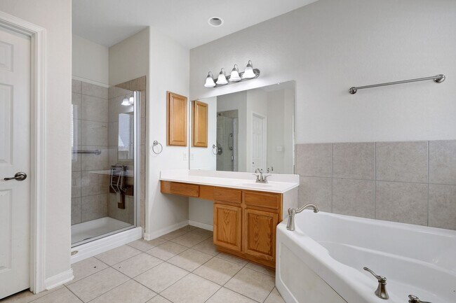 Building Photo - ***APPLICATION CURRENTLY UNDER REVIEW***Spacious & Stylish Living in a Premier Gated Community