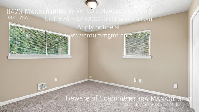 Building Photo - 8423 Magnolia Dr