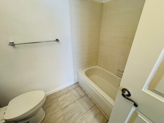 Building Photo - Don’t Judge the Outside—This 3BR Stuns Inside