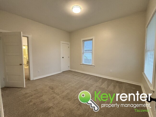 Building Photo - Newly Remodeled 2-Bedroom, 2-Bath Tacoma Home with Finished Basement, Large Backyard, and Detache...