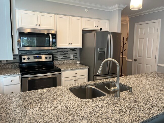 Building Photo - Remodeled 2 Bedroom, 2 Bath Furnished Cond...